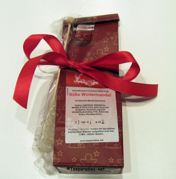 Teepräsent: Süße Wintermandel Früchtetee & 1 weißer Kandisstick mit rotem Band