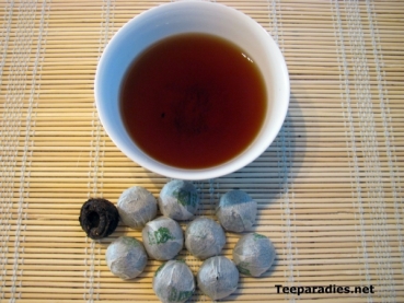 Preview: China Mini Tuo Cha feinster Pu Erh Tee 15 J. alt - 10 Stck 45 g. Preview: China Mini Tuo Cha feinster Pu Erh Tee 15 J. alt - 10 Stck 45 g.